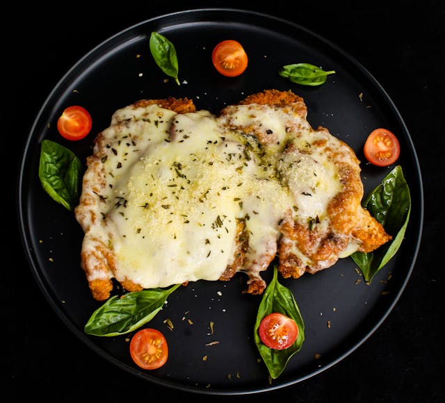 A plate of chicken parmigiana