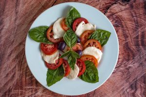 Farm to fork salad with herbs and tomatoes and cheese